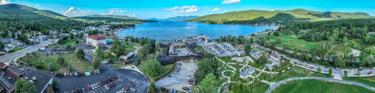 Panoramic aerial view of Lake George New York popular summer vacation destination with colonial wooden fort William Henry