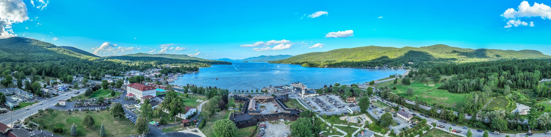 Panoramic aerial view of Lake George New York popular summer vacation destination with colonial wooden fort William Henry
