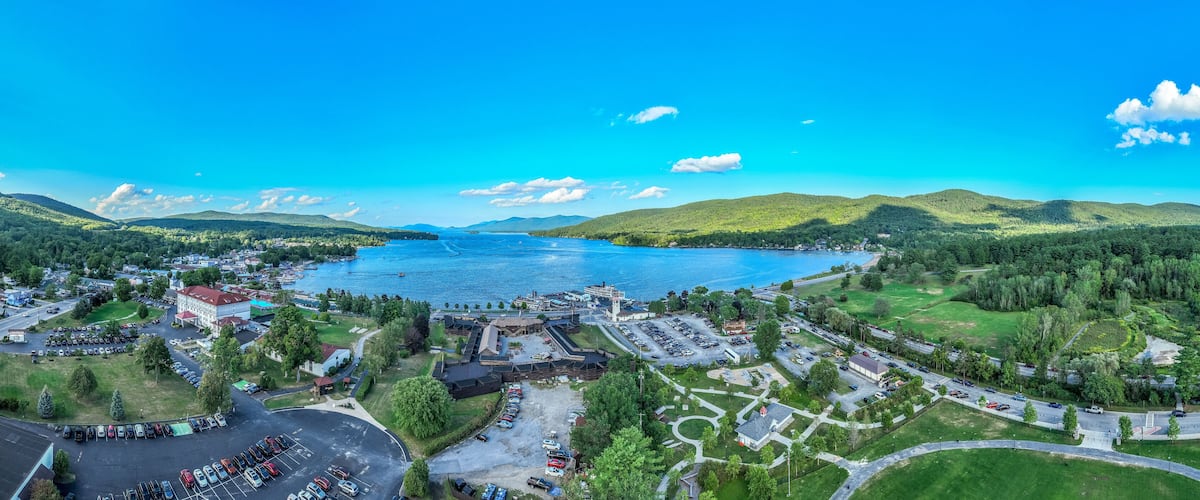 Panoramic aerial view of Lake George New York popular summer vacation destination with colonial wooden fort William Henry