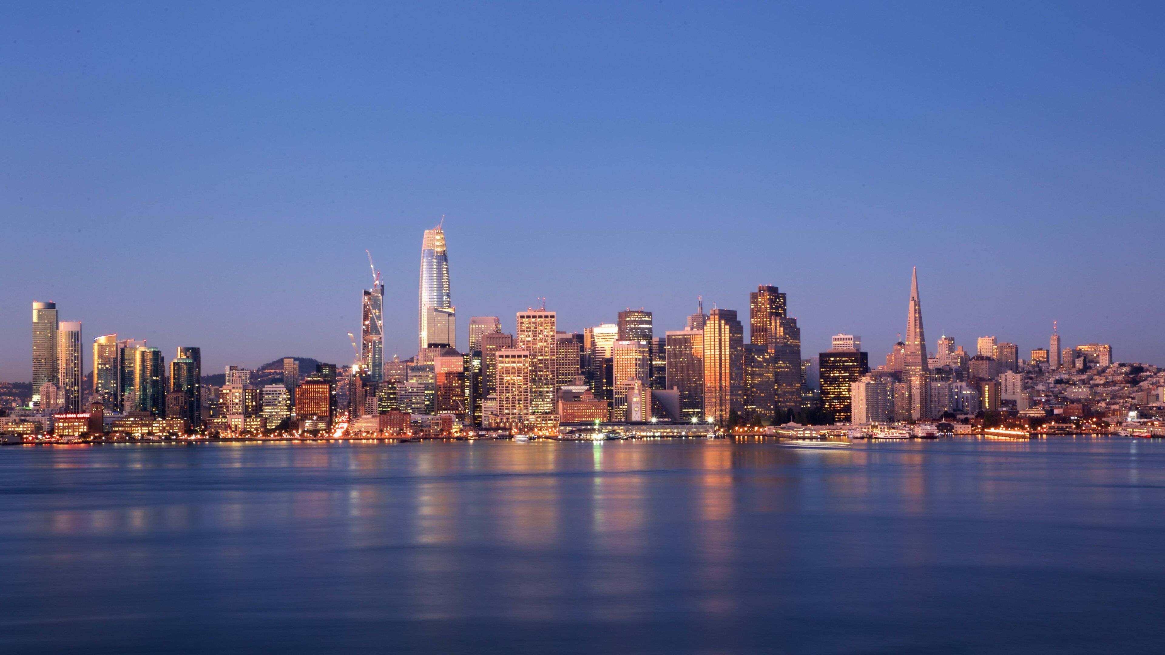 Bay Area featuring a bay or harbor, a city and a sunset