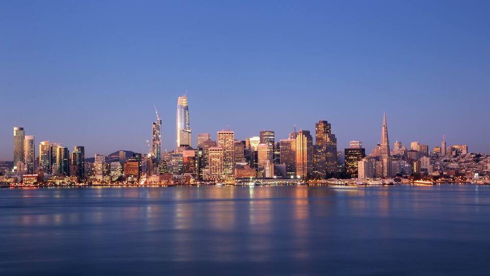 Bay Area featuring a bay or harbor, a city and a sunset