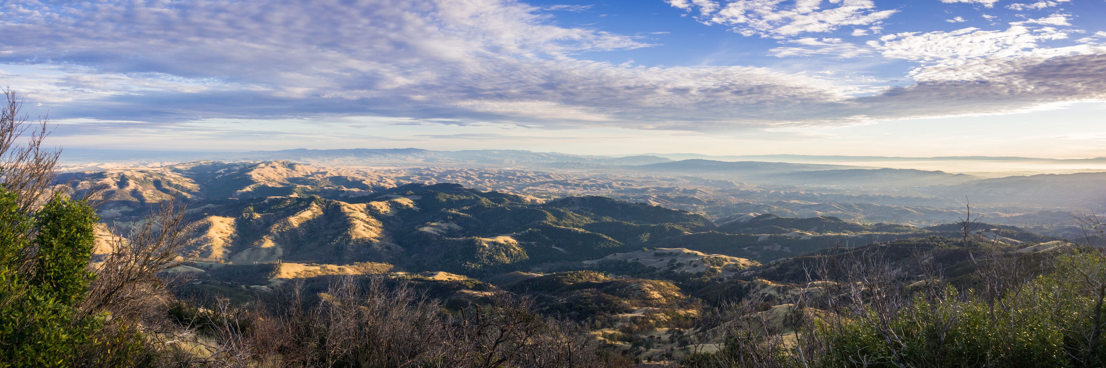 Panoramic view at sunset from the summit of Mt Diablo,  Pleasanton, Livermore and the bay covered in fog in the background, Mt Diablo SP, Contra Costa county, San Francisco bay area, California