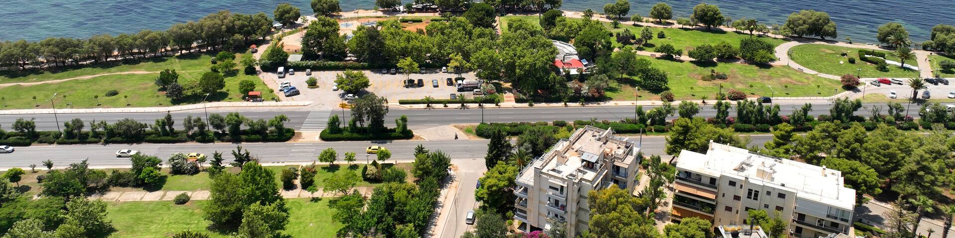 Aerial drone photo of famous seascape of Athens Riviera with crystal clear beaches, Voula, Saronic gulf, Attica, Greece