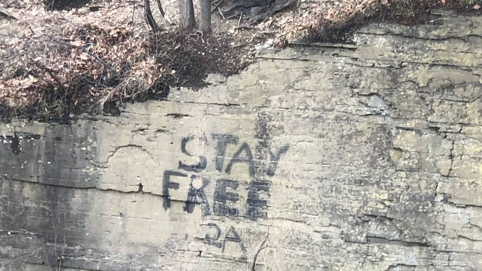 An awesome cliff jump launch site with the right sentiment: Stay Free #InStone