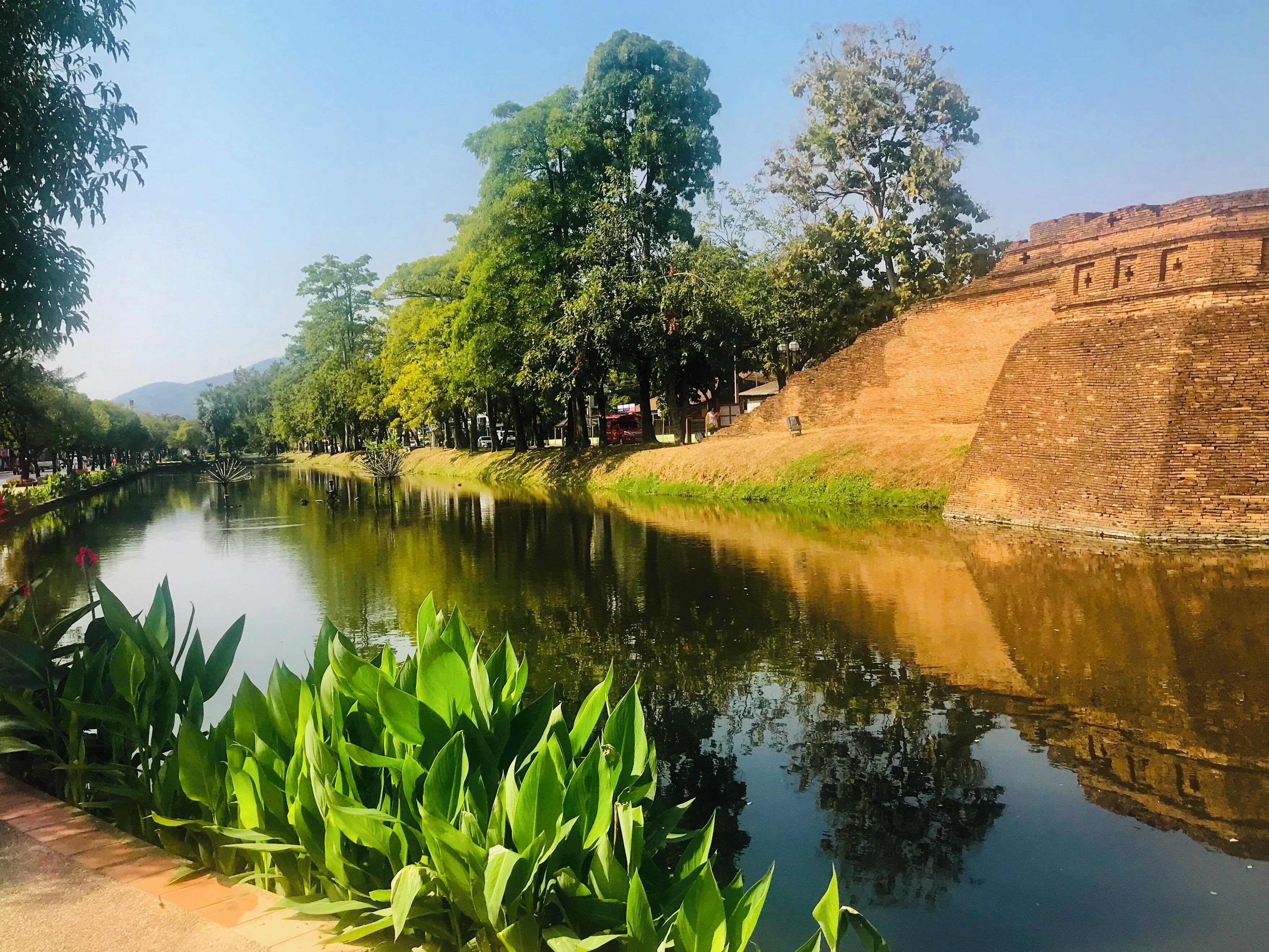 History meets serenity at Katum Corner, the southeast end of the Chiang Mai, Thailand wall and moat first constructed in 1296.