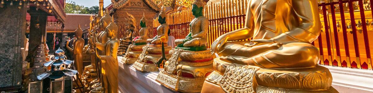 Line of Golden Buddhas at Wat Phrathat Doi Suthep Chiang Mai Thailand.