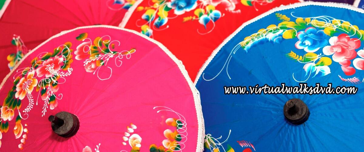 A collection of colorful umbrellas with floral designs.