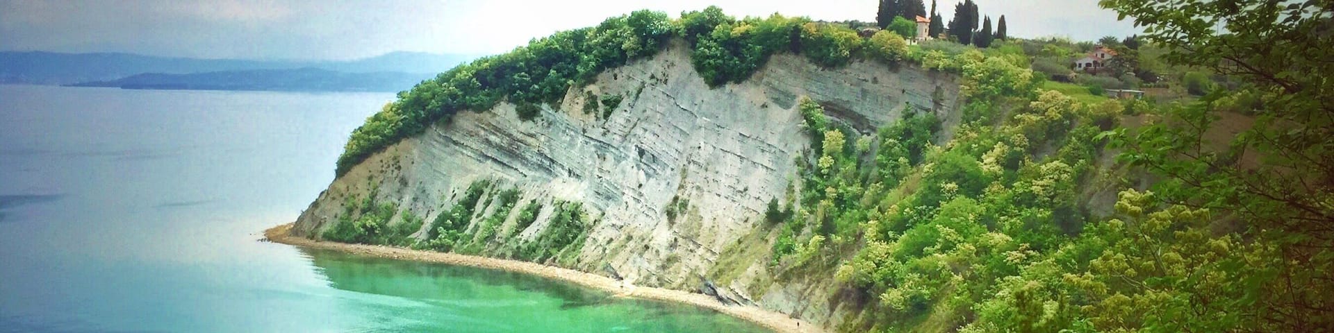 Slovenia's coastline is extremely short but it sure is pretty. It's funny how almost anywhere you turn in Slovenia there is emerald-colored water in some shape or form; if it is not the ocean it's a splashing waterfall, a serene lake or a wild river. It's awesome! #europe #slovenia #strunjancliff #green