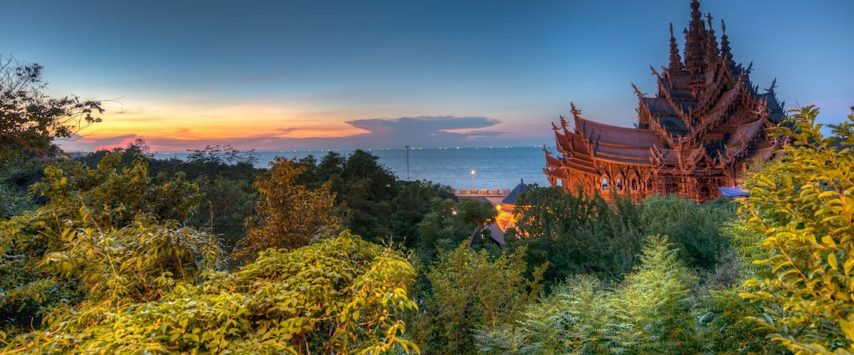Tucked away in Pattaya, you will find this beautifully carved wooden temple. The sunset over the ocean just adds to the mood. Not to be missed if you are into landscape photography.