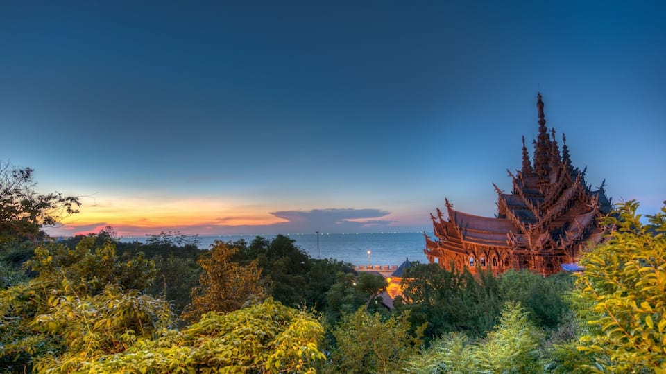 Tucked away in Pattaya, you will find this beautifully carved wooden temple. The sunset over the ocean just adds to the mood. Not to be missed if you are into landscape photography.
