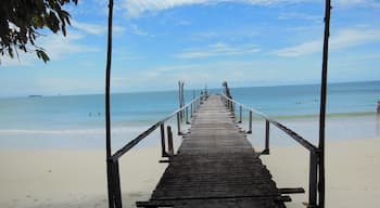 The white sand beaches with this rickety dock that seem to go out to unknown adventures ahead of me.