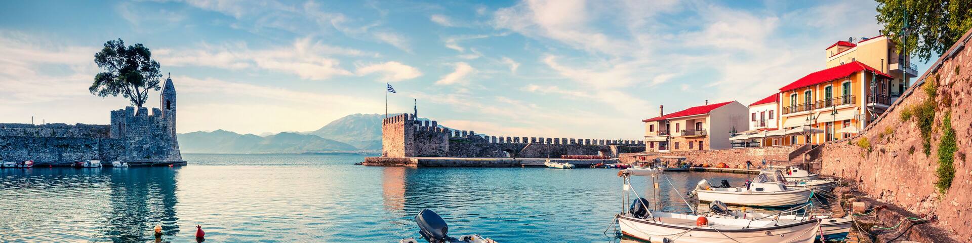 Colorful spring view of the Nafpaktos port. Fantastic morning scene of the Gulf of Corinth, Greece, Europe. Beauty of countryside concept background. Beauty of countryside concept background.
