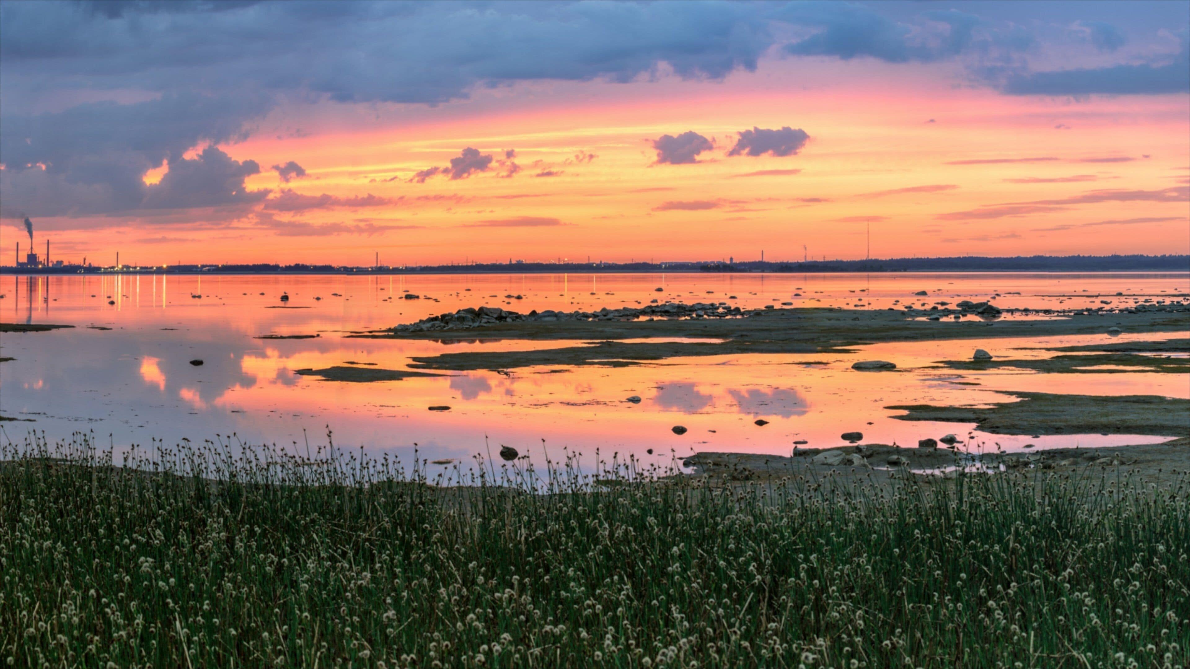 Oulu which includes landscape views, wetlands and a lake or waterhole