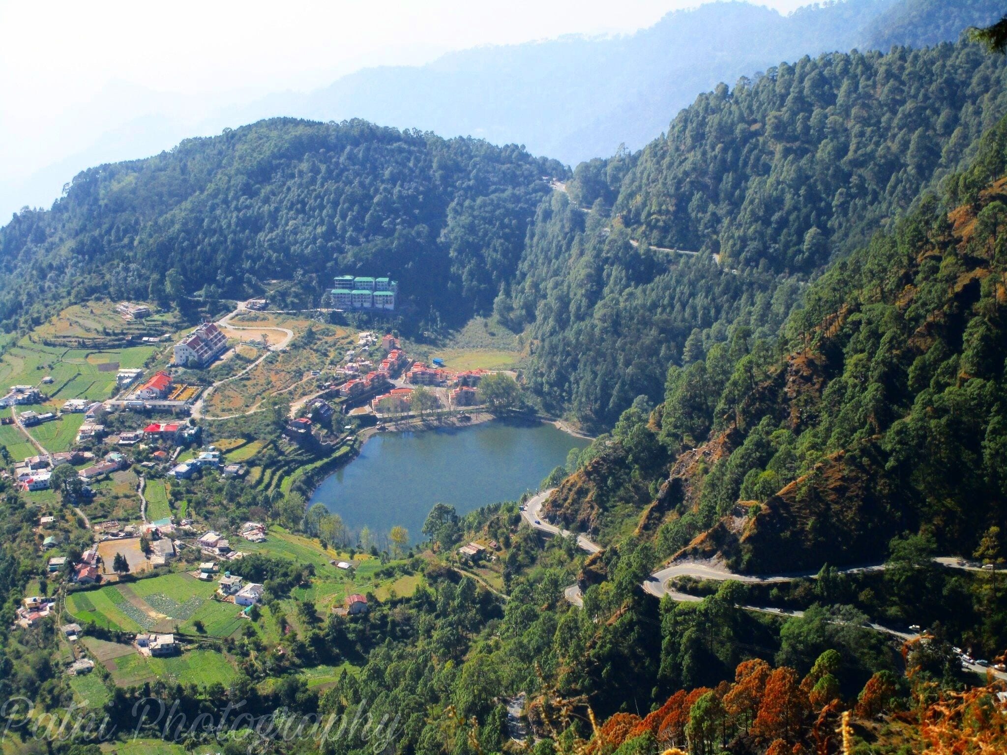 Nainital is a beautiful hill station with a lake in the middle and many small lakes all around the town. This view is one of the smaller lakes.
Beautiful place to visit, away from city , quite and peaceful.