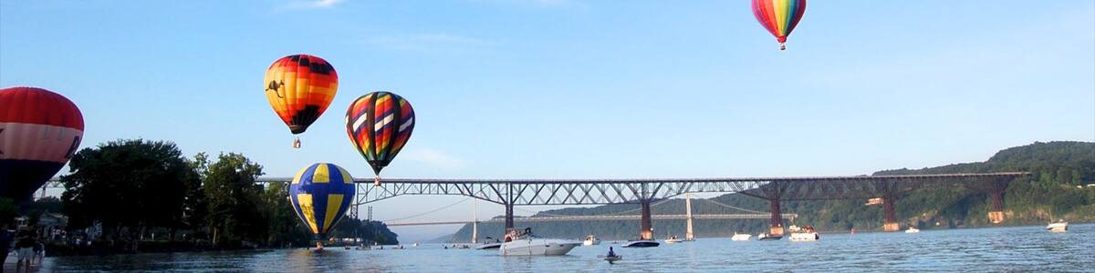 Poughkeepsie showing a river or creek, a bridge and ballooning