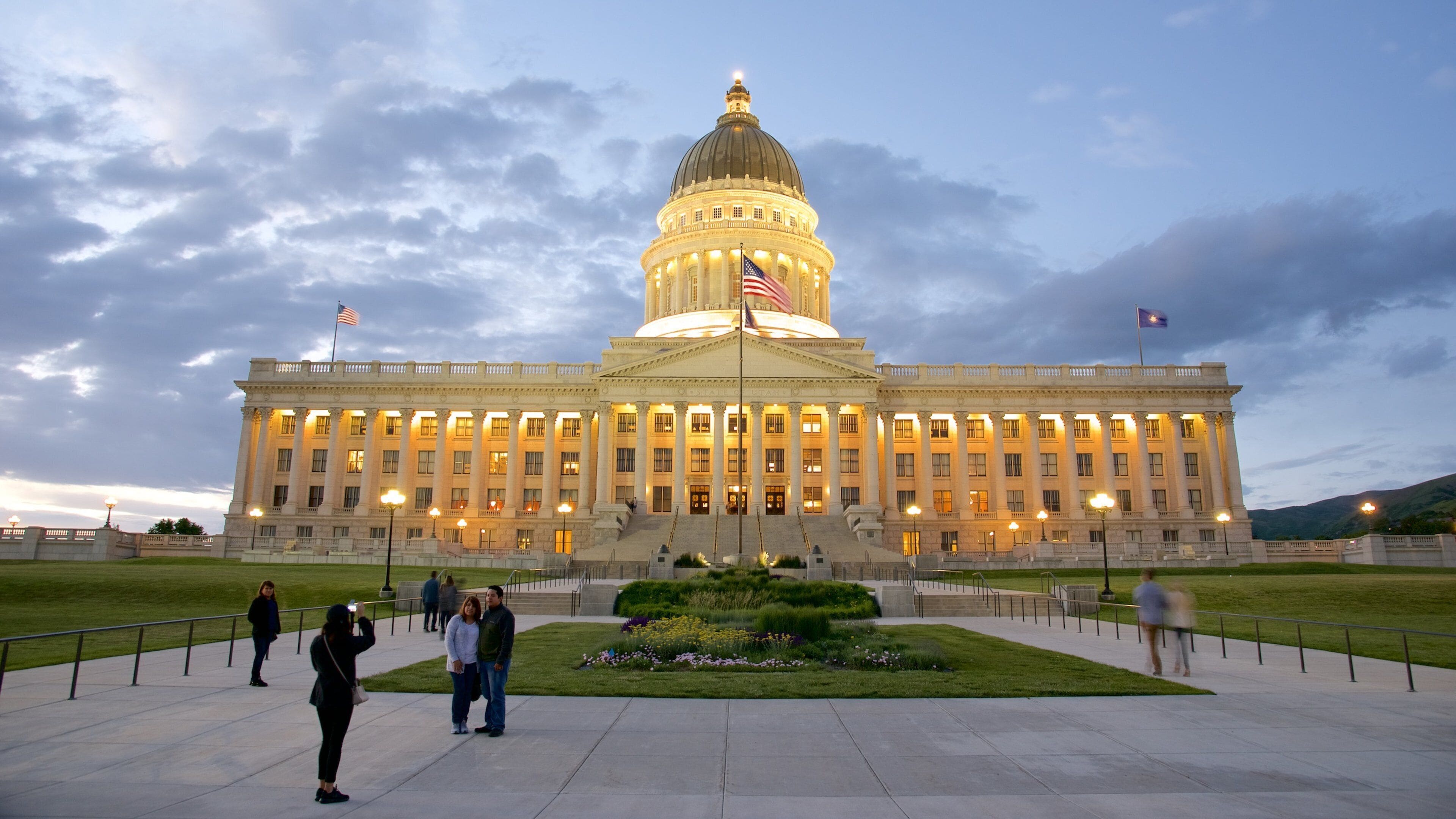 Downtown Salt Lake City which includes a sunset, heritage architecture and an administrative buidling