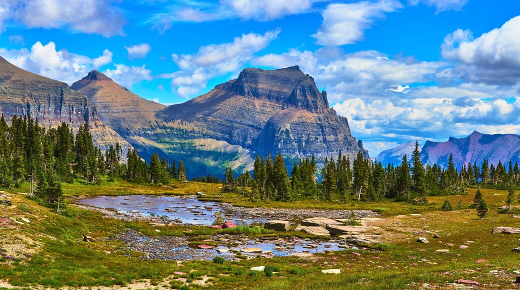 Panorama of Lake Water and Mountain Peaks Along Hidden Lake Trail in Montana