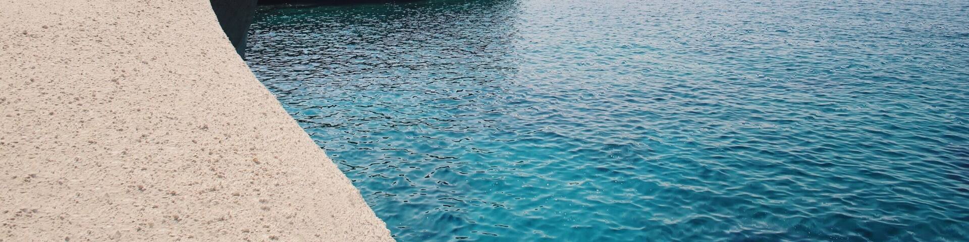 Sarakiniko beach on the north shore of the island of Milos. The white rocks here are often compared to the lunar surface of the moon. Definitely worth the day trip to one of the most beautiful beaches in the Aegean.