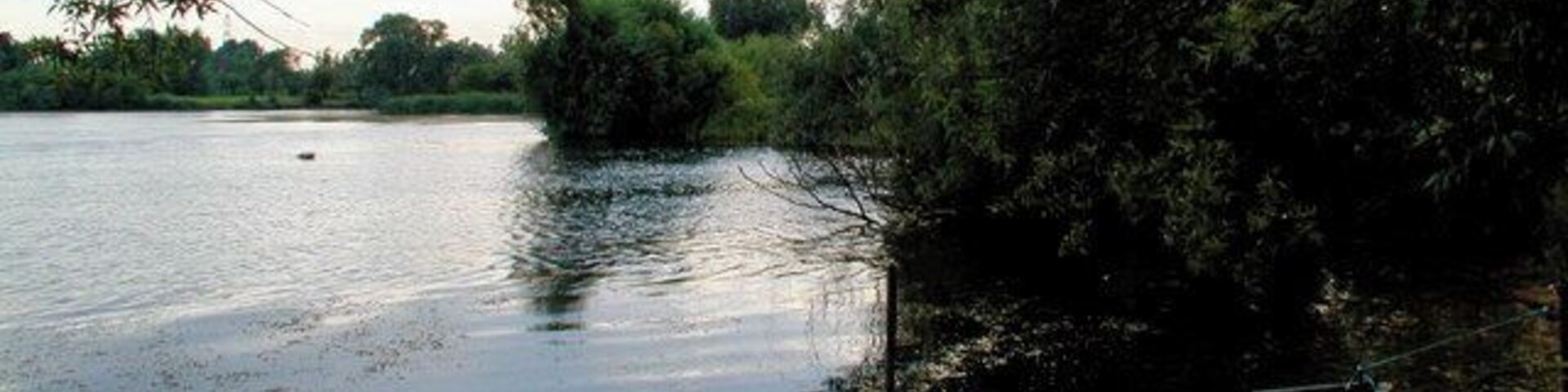 Wyboston Leisure Park. A view across the southern lake on a summer evening at Wyboston Leisure Park near St. Neots, Cambridgeshire.