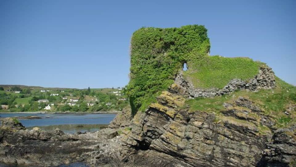 Knock Castle, near to Teangue/An Teanga, Highland, Great Britain. Although the site was once occupied by a dun, the existing remains of Caisteal Camus or Knock Castle date from the 15th-century when it was owned by the MacLeods. It was later captured by the MacDonalds and is said to be haunted by a 'Green Lady'.