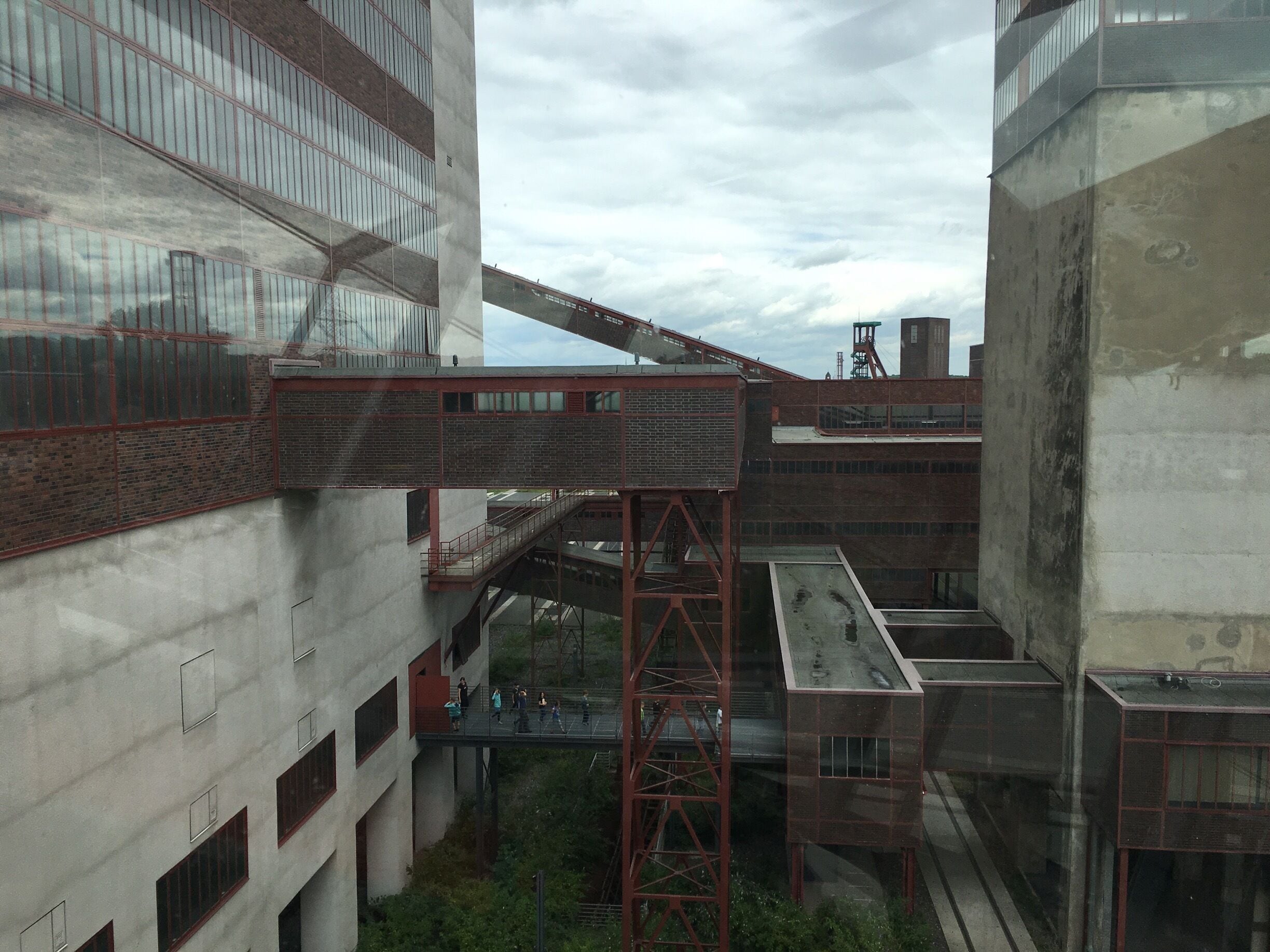 The Zollverein XII Coal Mine Industrial Complex is an important example of a European primary industry of great economic significance in the 19th and 20th centuries. It consists of the complete installations of a historical coal-mining site: the pits, coking plants, railway lines, pit heaps, miner’s housing and consumer and welfare facilities. The mine is especially noteworthy of the high architectural quality of its buildings of the Modern Movement.