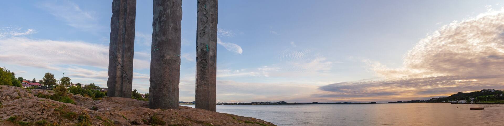 Mollebukta bay panorama with Swords in Rock monument commemorating Battle of Hafrsfjord Stavanger Rogaland Norway Scandinavia