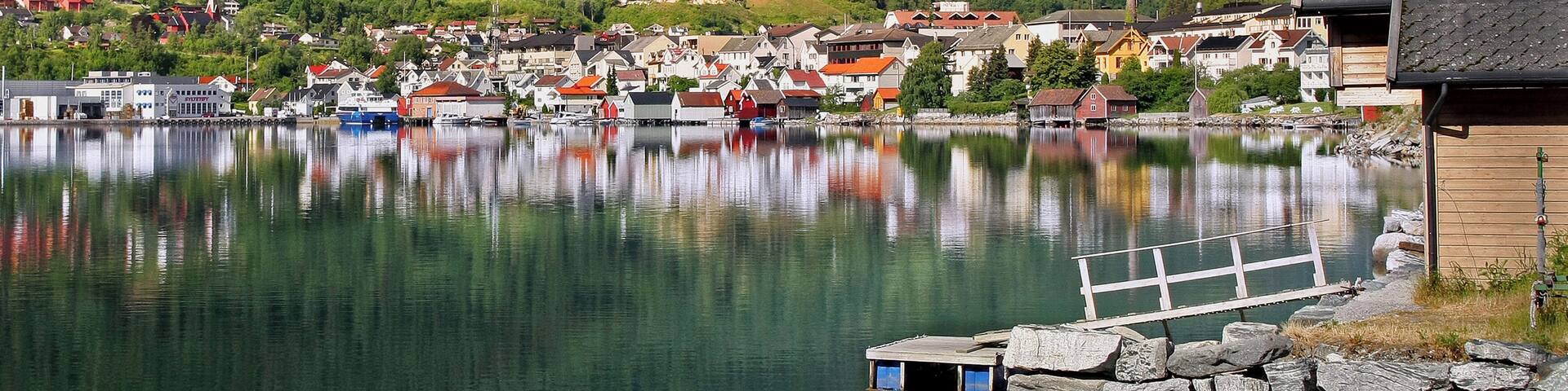 Sogndal reflecting in water at Sognfjord, Norway