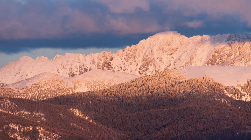 View of Indian Peaks from Fraser Valley Colorado. The west side of the Indian Peaks at sundown viewed from the Fraser Valley. The towns of Tabernash and Fraser are below the Indian Peaks.