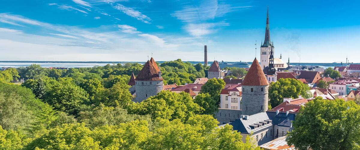 Tallinn in Estonia, panorama of the medieval city with Saint-Nicolas church, colorful houses and typical towers
