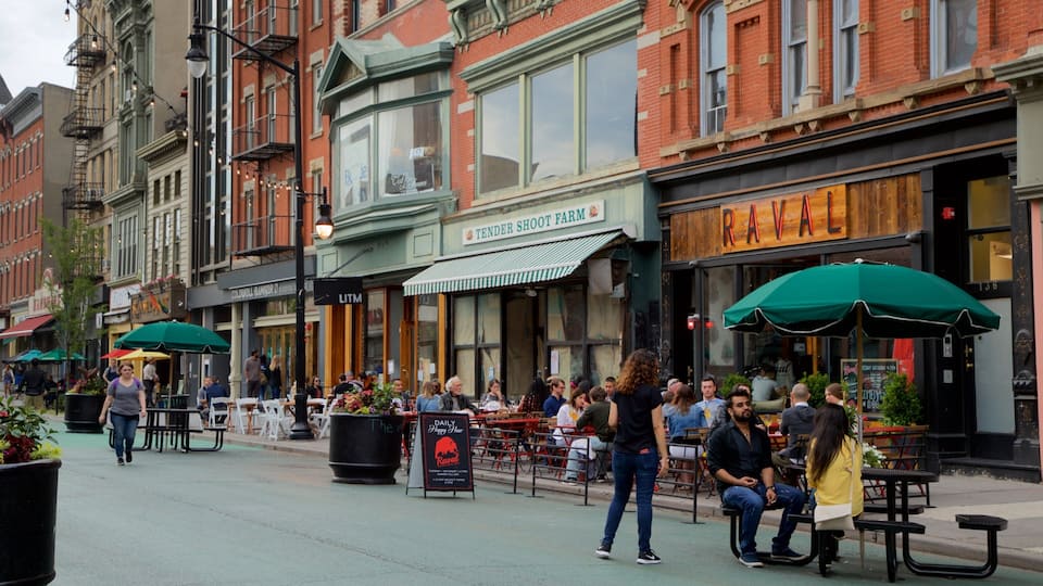 Downtown Jersey City which includes outdoor eating as well as a small group of people