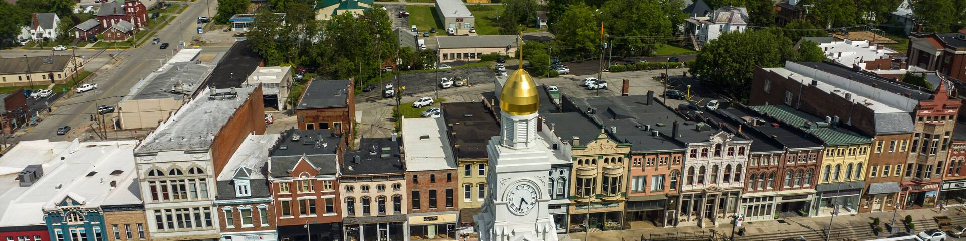 MAY 9, 2023 - WINCHESTER, KENTUCKY - aerial view of historic small town of Winchester with Town Clocktower and historic storefronts and buildings