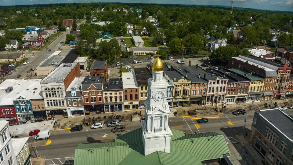 MAY 9, 2023 - WINCHESTER, KENTUCKY - aerial view of historic small town of Winchester with Town Clocktower and historic storefronts and buildings