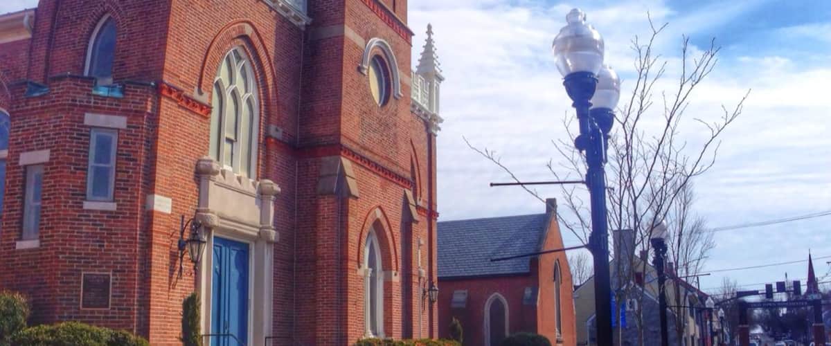 A nice 3 block outdoor downtown shopping area with dining and bars also.