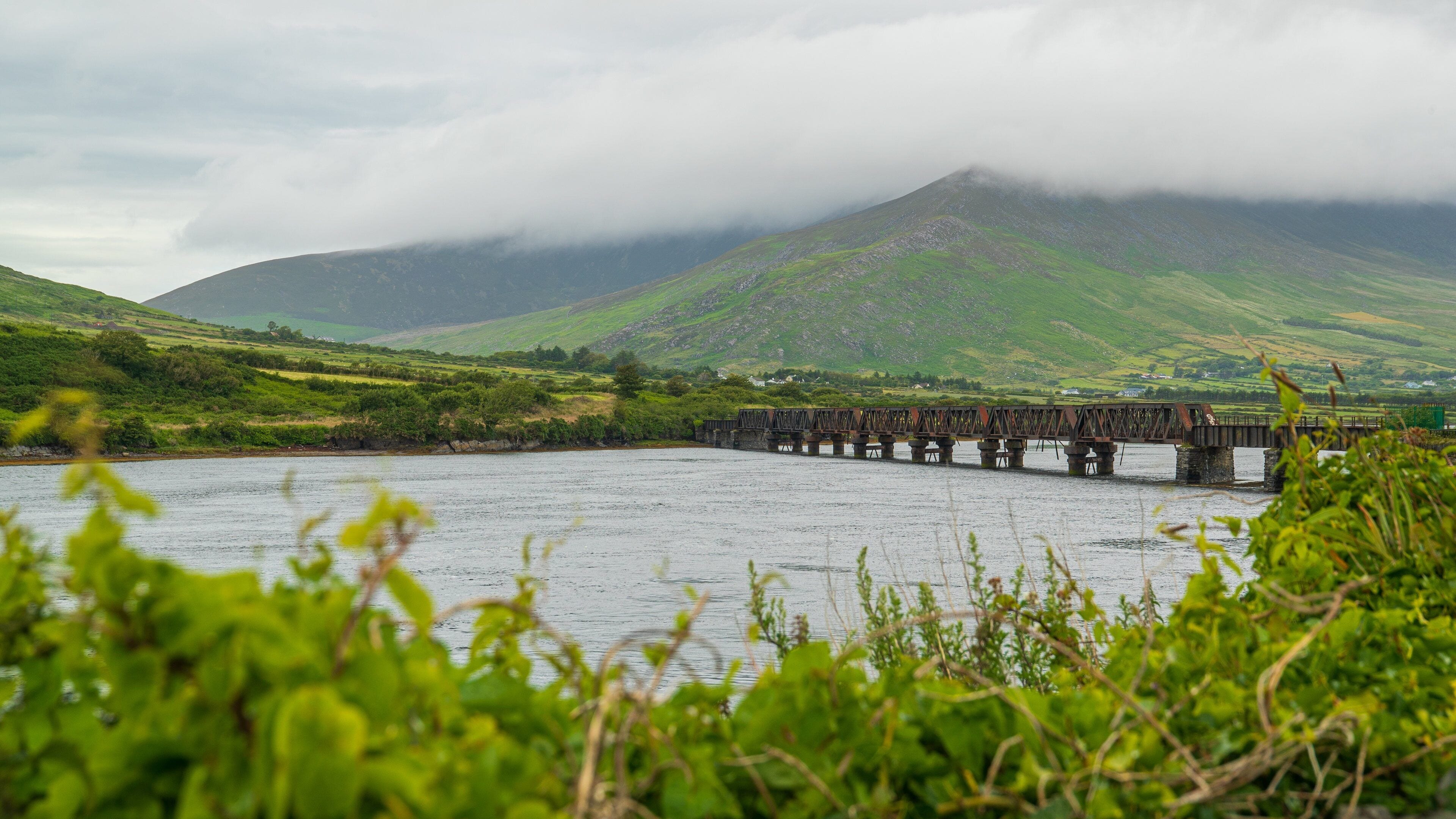 Ring of Kerry which includes a river or creek, a bridge and mountains