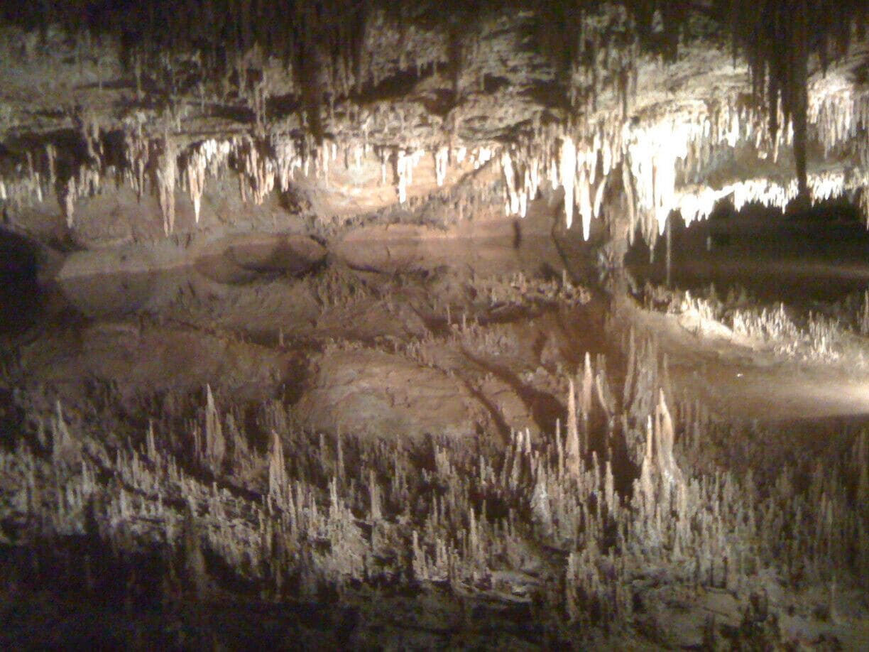 A cave with stalactites and stalagmites.