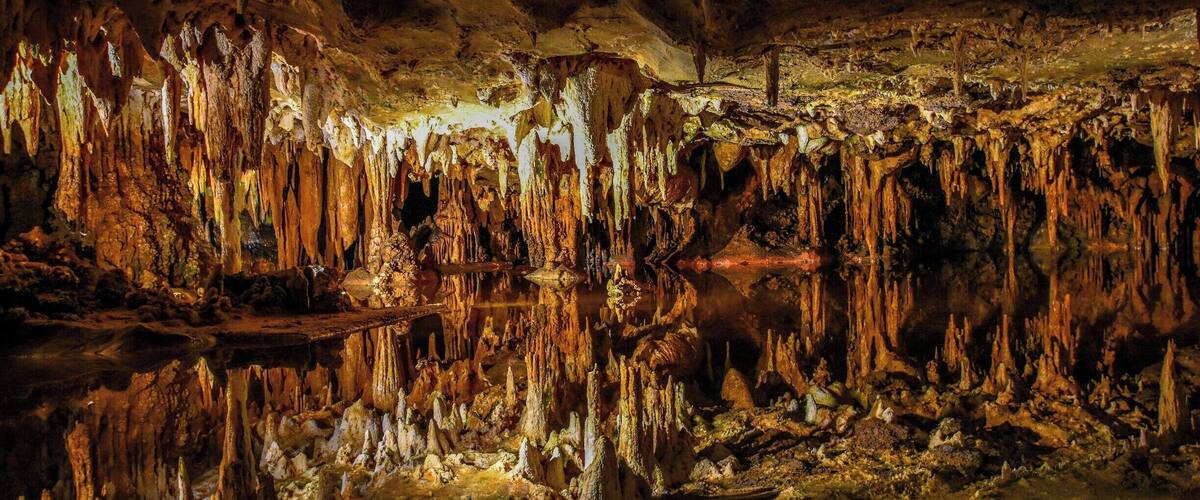 A world of subterranean wonders, a milestone in geological discoveries, Luray caverns, is a wonderful weekend getaway for those who are living near DC or Virginia. It is around 2 hours (or more) drive from washington DC.
This is a picture of the "Dream Lake", a spring of water which has a mirror-like appearance. Stalactites are reflected in the water making them appear to be stalagmites. This gives an illusion that the lake is deeper. The lake is connected to a spring that continues deeper into the caverns.
All in all, it was my first time exploring caverns. It was a fun filled day, learning the stories of the cavern.
Tips:
1) It is very crowded on weekends and holidays. If you want to enjoy peaceful, slow paced, less crowded tour of the caverns, go on weekdays.
2) If you visit the caverns, look for these things-
Saracen's tent - scarves and shawls of translucent calcite, falling in graceful folds, fringed with a thousand patterns, and so thin that a candle light can reveal the structure within!
The fried eggs formation - yes, it looks like fried eggs ;)
The Great Stalacpipe Organ - An actual organ which plays music- sounds of Stalactites! DO NOT miss this one!
#Nature