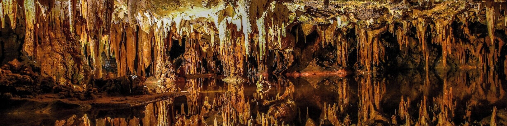 A world of subterranean wonders, a milestone in geological discoveries, Luray caverns, is a wonderful weekend getaway for those who are living near DC or Virginia. It is around 2 hours (or more) drive from washington DC.
This is a picture of the "Dream Lake", a spring of water which has a mirror-like appearance. Stalactites are reflected in the water making them appear to be stalagmites. This gives an illusion that the lake is deeper. The lake is connected to a spring that continues deeper into the caverns.
All in all, it was my first time exploring caverns. It was a fun filled day, learning the stories of the cavern.
Tips:
1) It is very crowded on weekends and holidays. If you want to enjoy peaceful, slow paced, less crowded tour of the caverns, go on weekdays.
2) If you visit the caverns, look for these things-
Saracen's tent - scarves and shawls of translucent calcite, falling in graceful folds, fringed with a thousand patterns, and so thin that a candle light can reveal the structure within!
The fried eggs formation - yes, it looks like fried eggs ;)
The Great Stalacpipe Organ - An actual organ which plays music- sounds of Stalactites! DO NOT miss this one!
#Nature