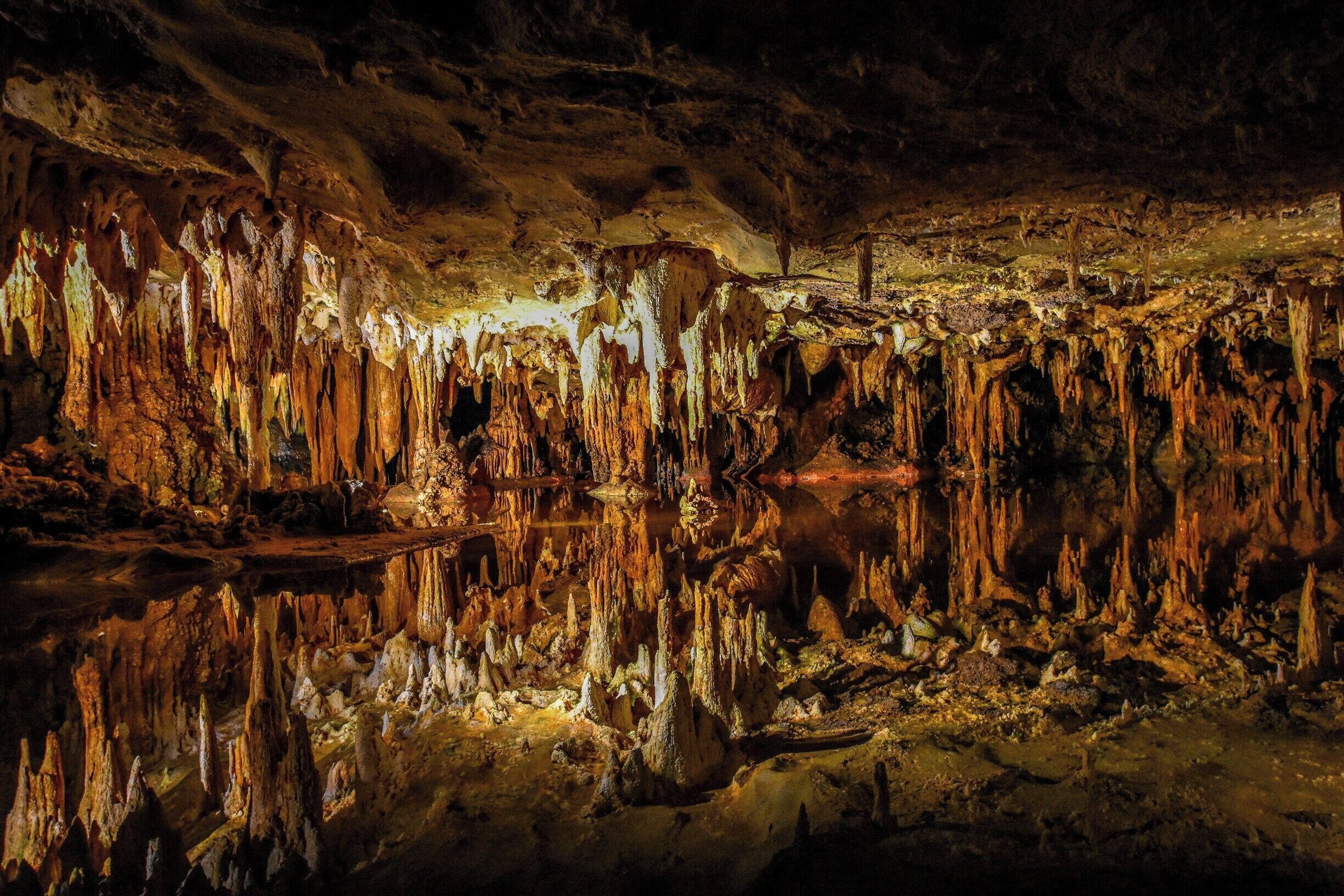 A cave with stalactites and stalagmites.