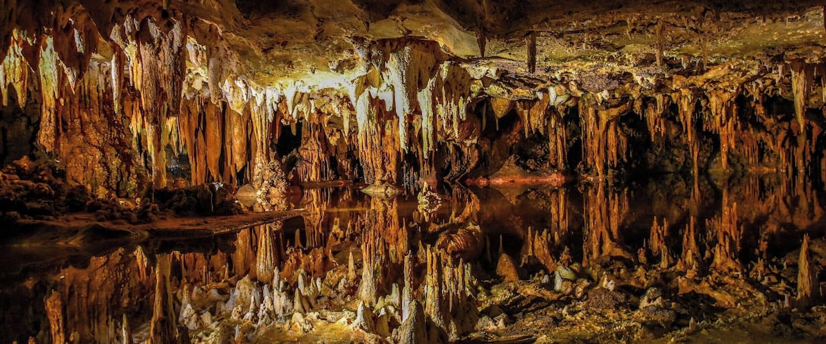 A cave with stalactites and stalagmites.