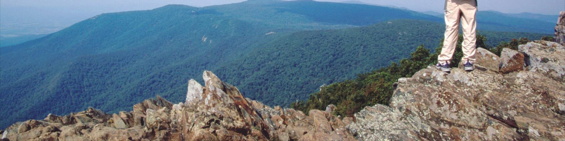 Luray featuring hiking or walking and mountains as well as an individual child