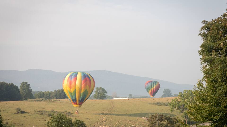 Hot air balloons takes flight in the early morning at the Wytheville Chautauqua Balloon Festival in 2021.