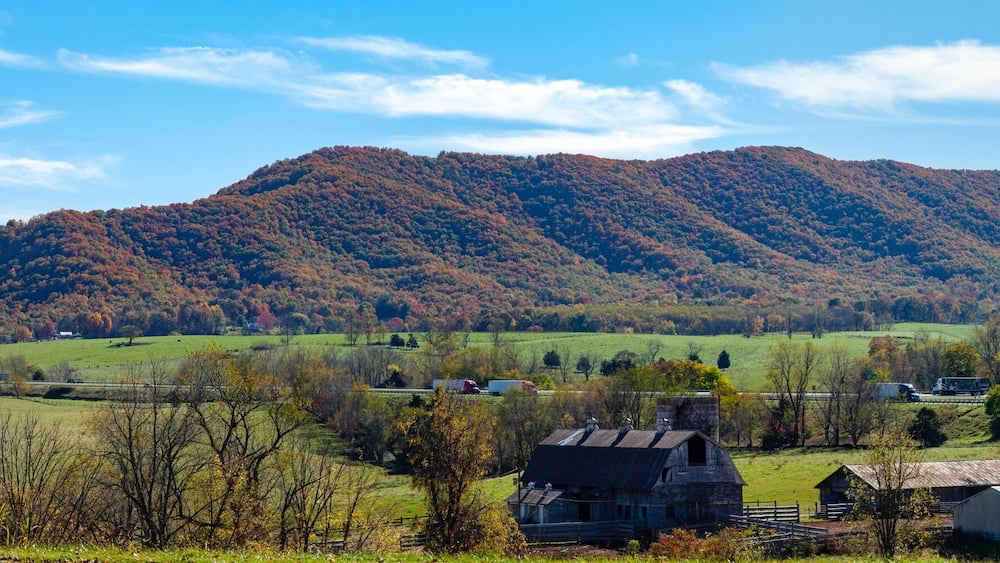 Panorama of mountains, valley and farmland with Interstate 77 in southwest Virginia.