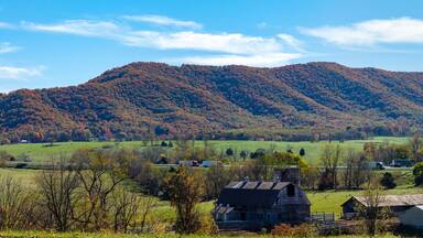 Panorama of mountains, valley and farmland with Interstate 77 in southwest Virginia.