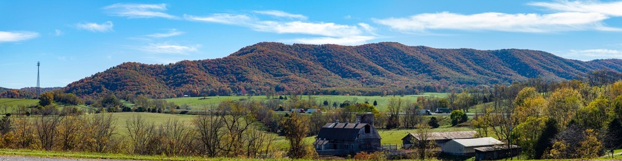 Panorama of mountains, valley and farmland with Interstate 77 in southwest Virginia.