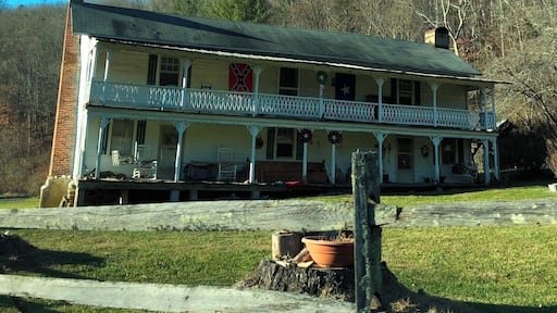 I took this picture in Carroll County, Va. I found this house by going down deep into the country roads. This picture represents what so many people think that mountain people live in. The house is ran down, it's surrounded by woods and there is a confederate flag displayed on the front of the house. When I saw this house, I instantly thought of a victorian style home in the 1950's and that whoever lived there most likely was considered wealthy. However, since the house is run down and has a confederate flag it may convey the idea that the people living in this house today are poor and a "redneck". I actually think that people who would rather live simple than extravagant live in this home. These people are probably your old time southerner. #appalchianechoes