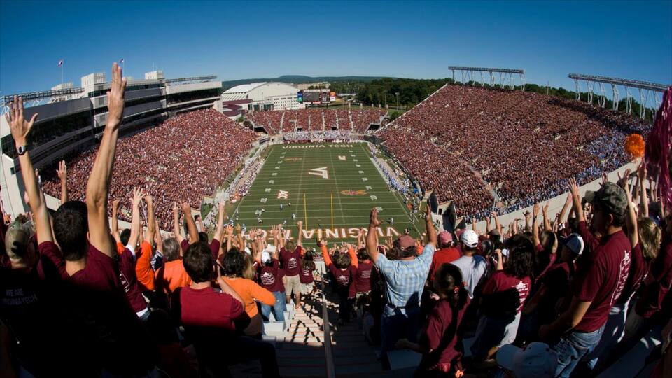 Blacksburg showing a sporting event as well as a large group of people