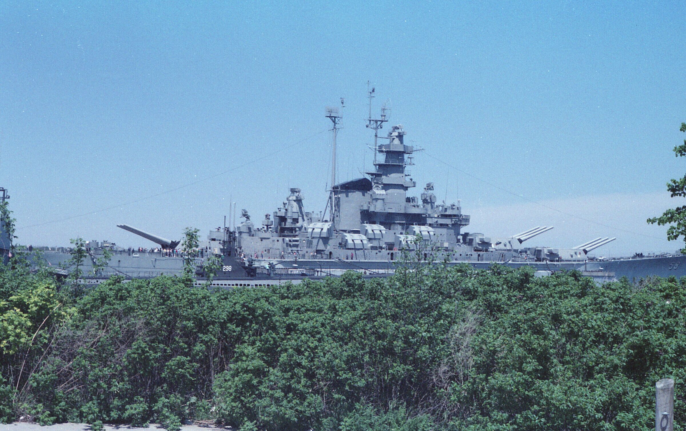 In the early 1990s, I took my Civil Air Patrol squadron to Battleship Cove in Massachusetts for a weekend tour and sleepover on the USS Massachusetts (BB-59). This longer shot also shows the conning tower of a submarine that is also preserved at the park.
