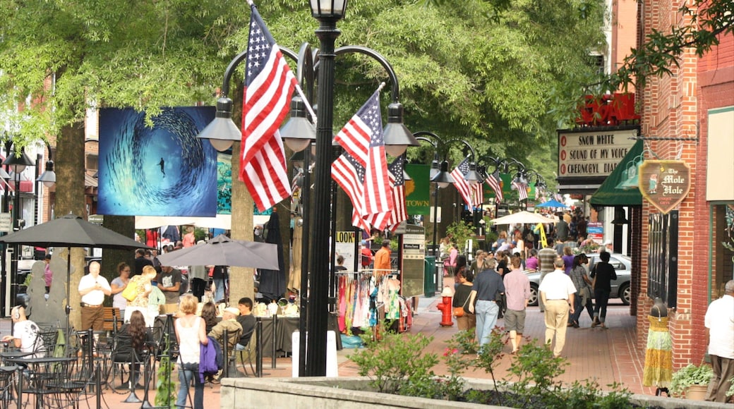 Charlottesville which includes a city and outdoor eating as well as a large group of people