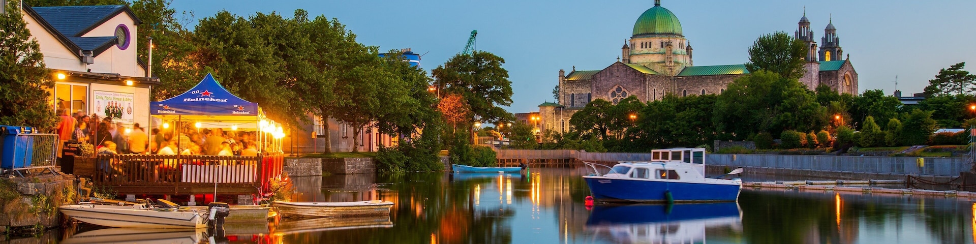Galway City Centre which includes a bay or harbor and night scenes