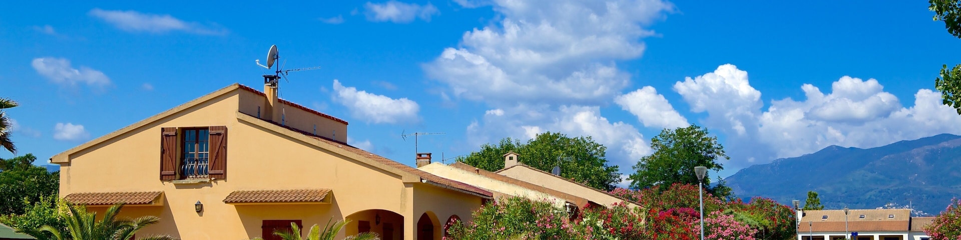 Northern Corsica featuring a house and a small town or village